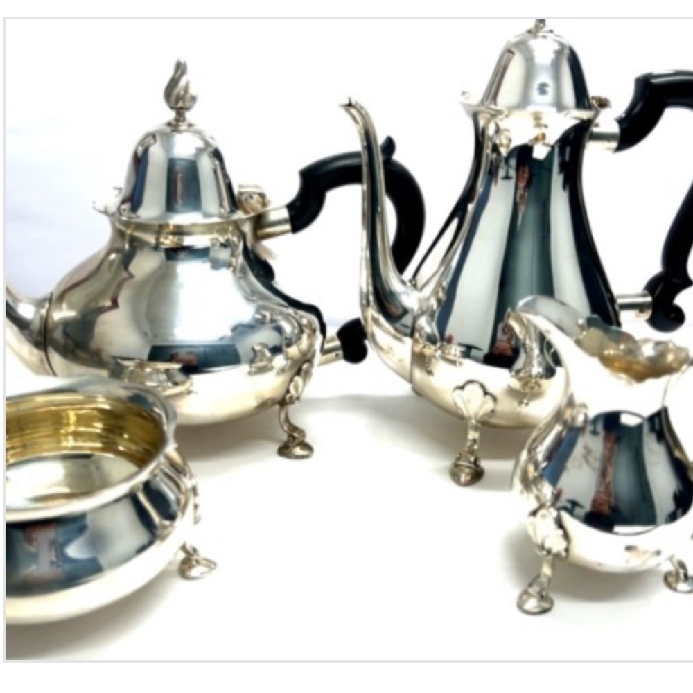 Tiffany & Co. four piece Queen Anne style tea set ebony wood handles